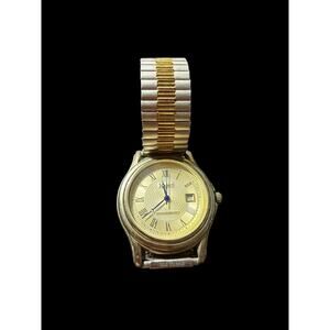 Stauer Gold Tone Quartz Wristwatch Two Tone Expansion Band Roman Numerals Date